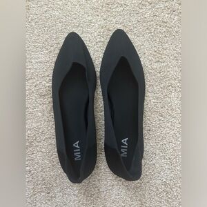 Black MIA flats